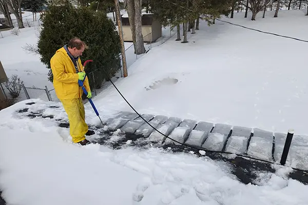 Removing an ice dam